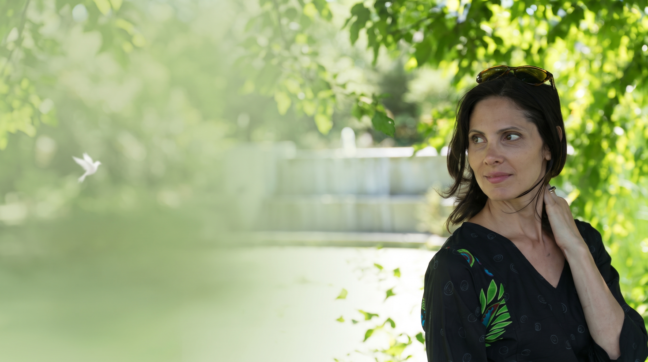 Gina Madeo in a peaceful garden setting